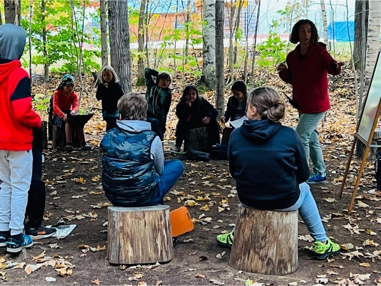 Ms. Abbott teachers her class in the forest classroom.